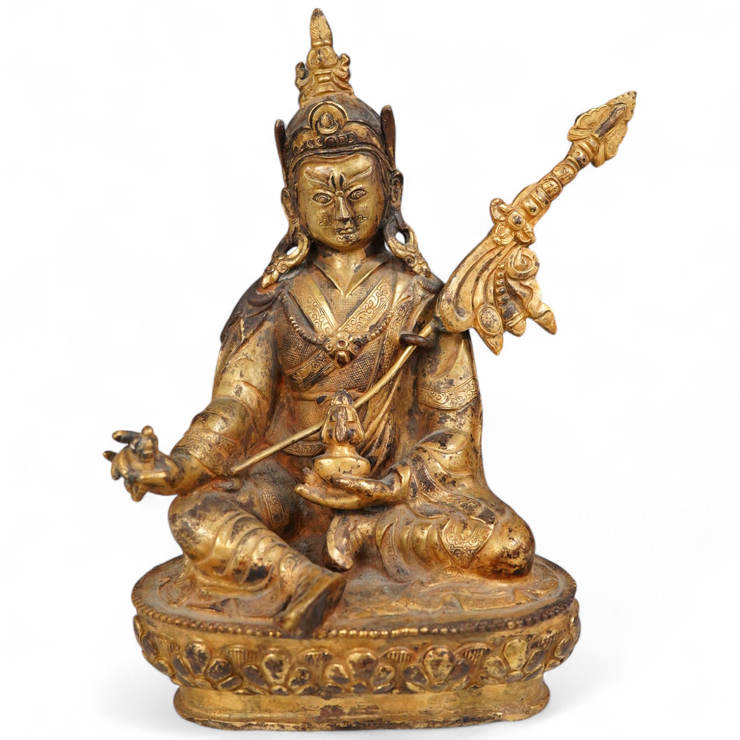 A gilt bronze figure of Padmasambhava, 22cm